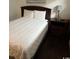 Bedroom with a double bed, nightstand and dark hardwood floors at 2600 South Ocean Blvd. # 110, Myrtle Beach, SC 29577