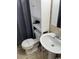 Simple bathroom with toilet, sink, and shower at 2600 South Ocean Blvd. # 110, Myrtle Beach, SC 29577