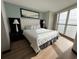 Spacious main bedroom with ocean view and plush bedding at 107 S Ocean Blvd. S # 1208, Myrtle Beach, SC 29577