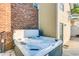 Hot tub on patio next to brick house at 1418 S Ocean Blvd., North Myrtle Beach, SC 29582