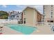 Private backyard pool with hot tub and patio furniture at 1418 S Ocean Blvd., North Myrtle Beach, SC 29582