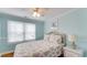Bedroom with double bed, nightstand, and ceiling fan at 1418 S Ocean Blvd., North Myrtle Beach, SC 29582