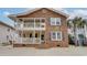 Brick two-story house with front porch and balcony at 1418 S Ocean Blvd., North Myrtle Beach, SC 29582