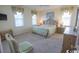 Bedroom with king bed and ocean view at 230 Sea Oats Circle, Pawleys Island, SC 29585