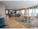Spacious living room and dining area with hardwood floors and ocean views at 230 Sea Oats Circle, Pawleys Island, SC 29585