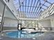Indoor pool area with a skylight and plenty of natural light at 5905 S Kings Hwy. # 337B, Myrtle Beach, SC 29575