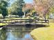 Wooden footbridge over a tranquil pond at 5905 S Kings Hwy. # 337B, Myrtle Beach, SC 29575