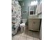 Clean bathroom with updated vanity and beach-themed decor at 5905 S Kings Hwy. # 337B, Myrtle Beach, SC 29575