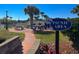 Outdoor picnic area with tables, grills, and palm trees at 5905 S Kings Hwy. # 337B, Myrtle Beach, SC 29575