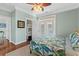Bedroom with hardwood floors, tropical bedding, and access to bunk beds at 1010 Perrin Dr., North Myrtle Beach, SC 29582