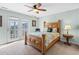 Bedroom with a full-size bed and private balcony at 1010 Perrin Dr., North Myrtle Beach, SC 29582