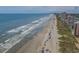 Beachfront aerial view showing the ocean and sandy beach at 1010 Perrin Dr., North Myrtle Beach, SC 29582