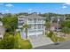 Two-story house with a two-car garage and driveway at 1010 Perrin Dr., North Myrtle Beach, SC 29582