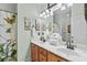 Bathroom with double vanity and a walk-in shower at 1010 Perrin Dr., North Myrtle Beach, SC 29582