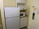 White appliances including a refrigerator and microwave at 1207 S Ocean Blvd. # 50512, Myrtle Beach, SC 29577