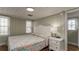 Main bedroom with a king-size bed and nightstand at 1906 S Ocean Blvd., North Myrtle Beach, SC 29582