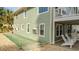 Side yard with shuffleboard and patio seating at 1906 S Ocean Blvd., North Myrtle Beach, SC 29582