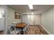 Small kitchen with white cabinets and refrigerator at 1906 S Ocean Blvd., North Myrtle Beach, SC 29582