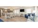 Open living room and kitchen with white cabinets at 510 Hillside Dr. S, North Myrtle Beach, SC 29582