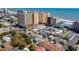 Aerial view of beach neighborhood showcasing homes near the ocean at 510 Hillside Dr. S, North Myrtle Beach, SC 29582