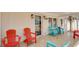 Front porch with colorful chairs and tile flooring at 510 Hillside Dr. S, North Myrtle Beach, SC 29582