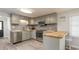 Modern kitchen featuring stainless steel appliances and butcher block countertops at 510 Hillside Dr. S, North Myrtle Beach, SC 29582