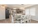 Spacious dining area with a kitchen view and hardwood floors at 510 Hillside Dr. S, North Myrtle Beach, SC 29582