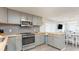 Eat-in kitchen with stainless steel appliances and ample counter space at 510 Hillside Dr. S, North Myrtle Beach, SC 29582