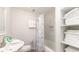 Clean bathroom with a tub shower combination and built-in shelving at 510 Hillside Dr. S, North Myrtle Beach, SC 29582
