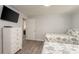 Bright bedroom with two twin beds, dresser, and access to the hallway at 510 Hillside Dr. S, North Myrtle Beach, SC 29582