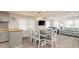 Bright dining area with a large table and chairs, perfect for Gathering gatherings at 510 Hillside Dr. S, North Myrtle Beach, SC 29582