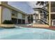 Relaxing outdoor pool area with building views at 1207 S Ocean Blvd. # 21008, Myrtle Beach, SC 29577