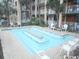 Small, rectangular pool with a central feature at 1207 S Ocean Blvd. # 21008, Myrtle Beach, SC 29577