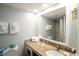 Bathroom with granite countertop and a large mirror at 1207 S Ocean Blvd. # 20606, Myrtle Beach, SC 29577