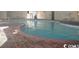 Indoor pool with brick floor at 1207 S Ocean Blvd. # 20606, Myrtle Beach, SC 29577