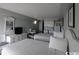 Bedroom with two double beds, kitchenette, and a TV at 1207 S Ocean Blvd. # 20606, Myrtle Beach, SC 29577