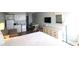 King bed, dresser, and kitchenette in a hotel room at 1207 S Ocean Blvd. # 20203, Myrtle Beach, SC 29577