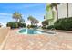 Resort-style pool with surrounding patio and lush landscaping at 1105 S Ocean Blvd. # 246, Myrtle Beach, SC 29577