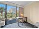 Desk and chair with balcony access, perfect for remote work at 1105 S Ocean Blvd. # 246, Myrtle Beach, SC 29577
