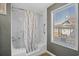 Updated bathroom with shower/tub combo and window at 6001 - Mh197 South Kings Hwy., Myrtle Beach, SC 29575