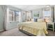 Bright bedroom with a king-size bed and large windows at 6001 - Mh197 South Kings Hwy., Myrtle Beach, SC 29575