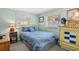 Small bedroom with full-size bed and charming decor at 6001 - Mh197 South Kings Hwy., Myrtle Beach, SC 29575