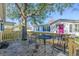 Small deck with metal table and chairs, overlooking the yard at 6001 - Mh197 South Kings Hwy., Myrtle Beach, SC 29575