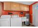 Laundry room with washer, dryer, and extra storage at 6001 - Mh197 South Kings Hwy., Myrtle Beach, SC 29575