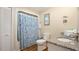 Clean bathroom with shower/tub combo and granite countertop at 304 2Nd Ave. S, North Myrtle Beach, SC 29582
