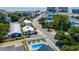 Aerial view of a beach town and a house with a pool at 304 2Nd Ave. S, North Myrtle Beach, SC 29582