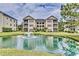 Building exterior with pond and fountain in front at 2050 Cross Gate Blvd. # 303, Myrtle Beach, SC 29575
