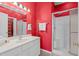 Bathroom with white vanity and shower at 2050 Cross Gate Blvd. # 303, Myrtle Beach, SC 29575