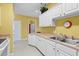 Kitchen with white cabinets, double sink, and neutral color scheme at 2050 Cross Gate Blvd. # 303, Myrtle Beach, SC 29575