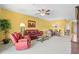 Relaxing living room with red leather furniture and a ceiling fan at 2050 Cross Gate Blvd. # 303, Myrtle Beach, SC 29575